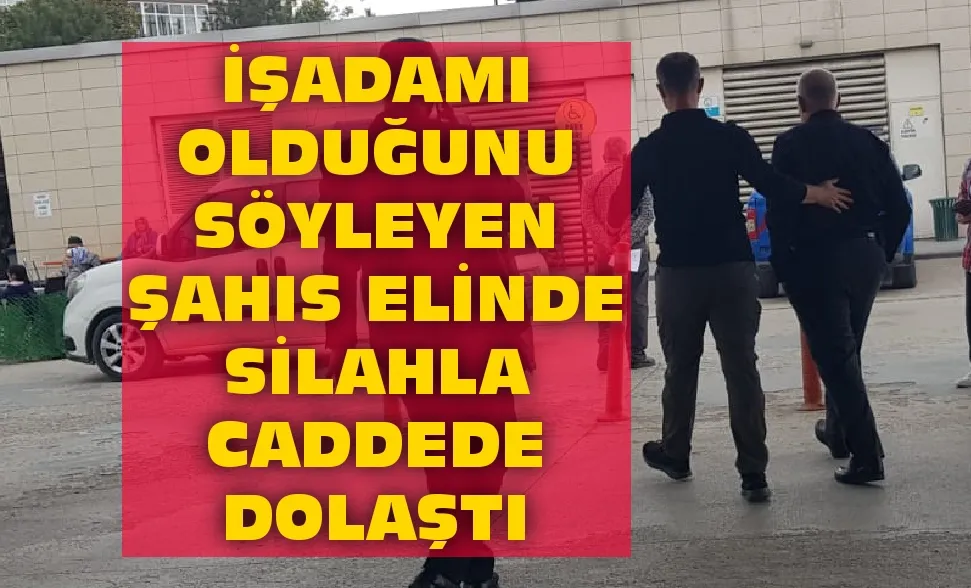 İşadamı olduğunu söyleyen şahıs elinde silahla caddede dolaştı