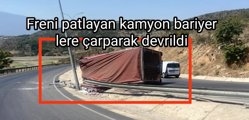 Freni patlayan kamyon bariyerlere çarparak devrildi